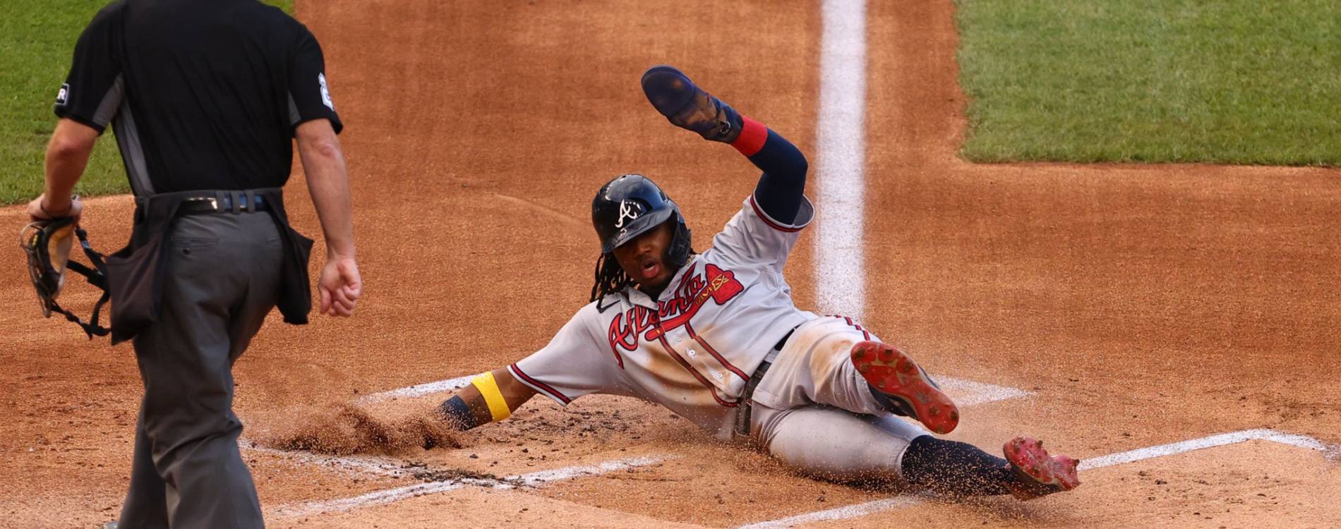Ronald Acuna Jr slides into home