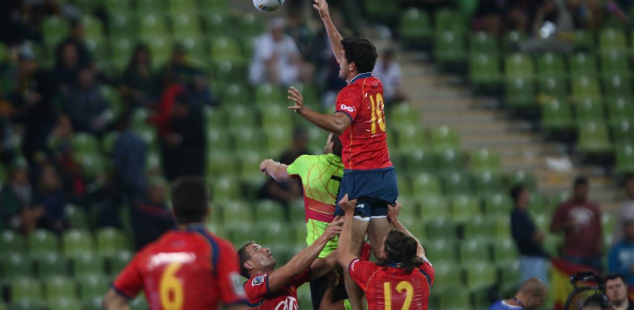 Spain contest a ball with Portugal