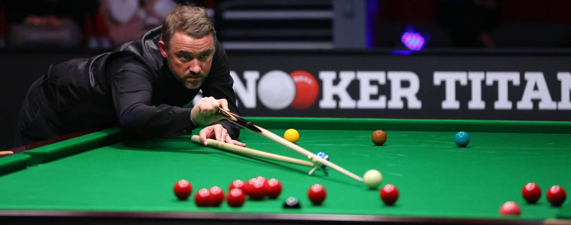 Stephen Hendry plays a shot
