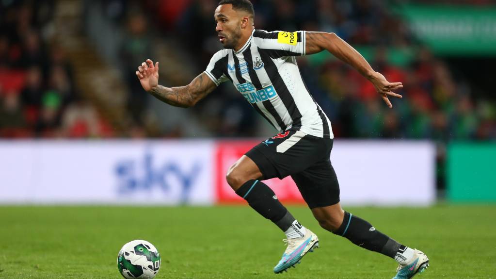Striker Callum Wilson carries the ball for Newcastle United