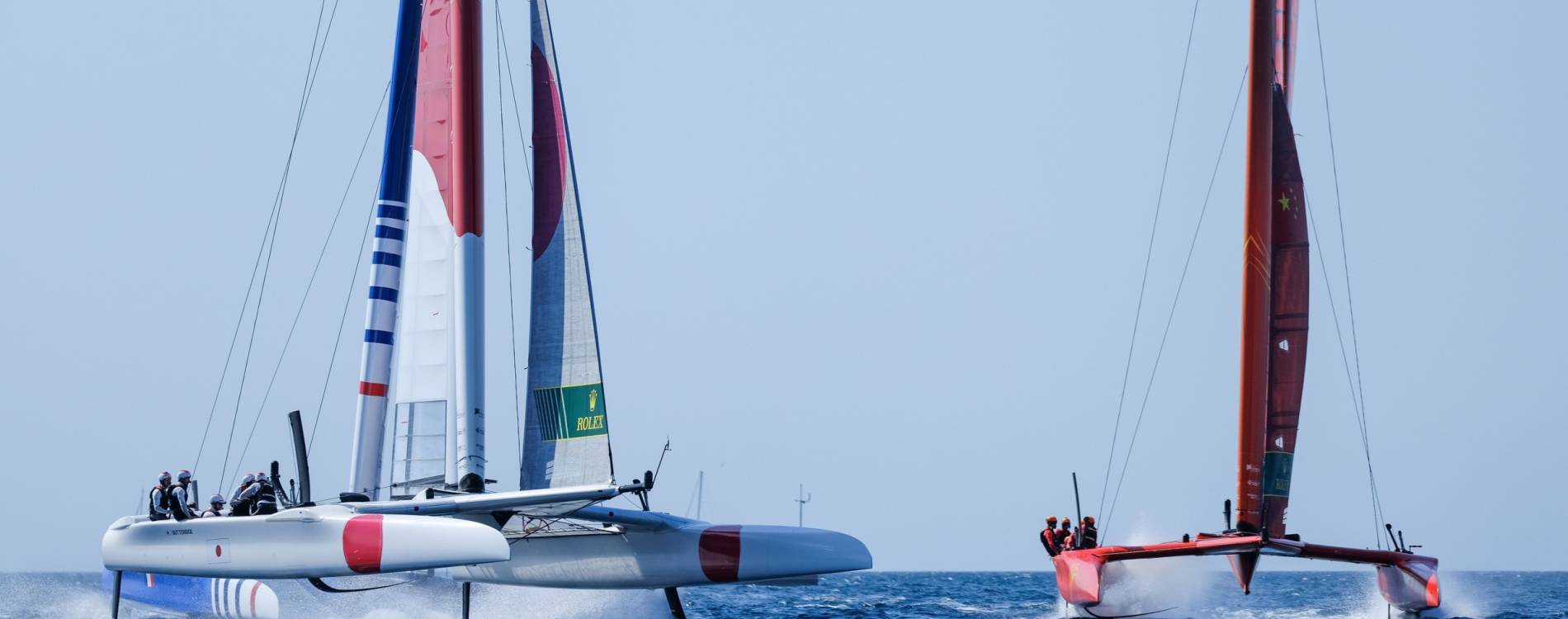 Team France and Team China compete in a SailGP race