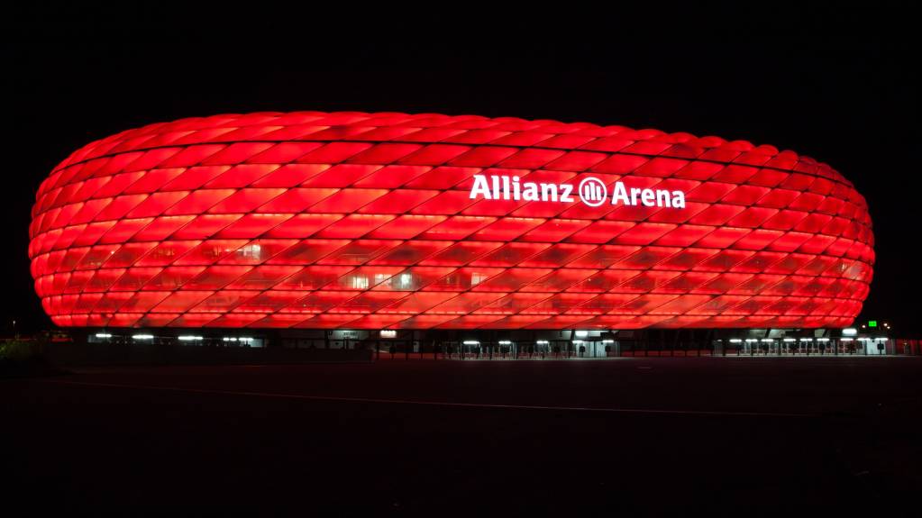 The Allianz Arena illuminated in red