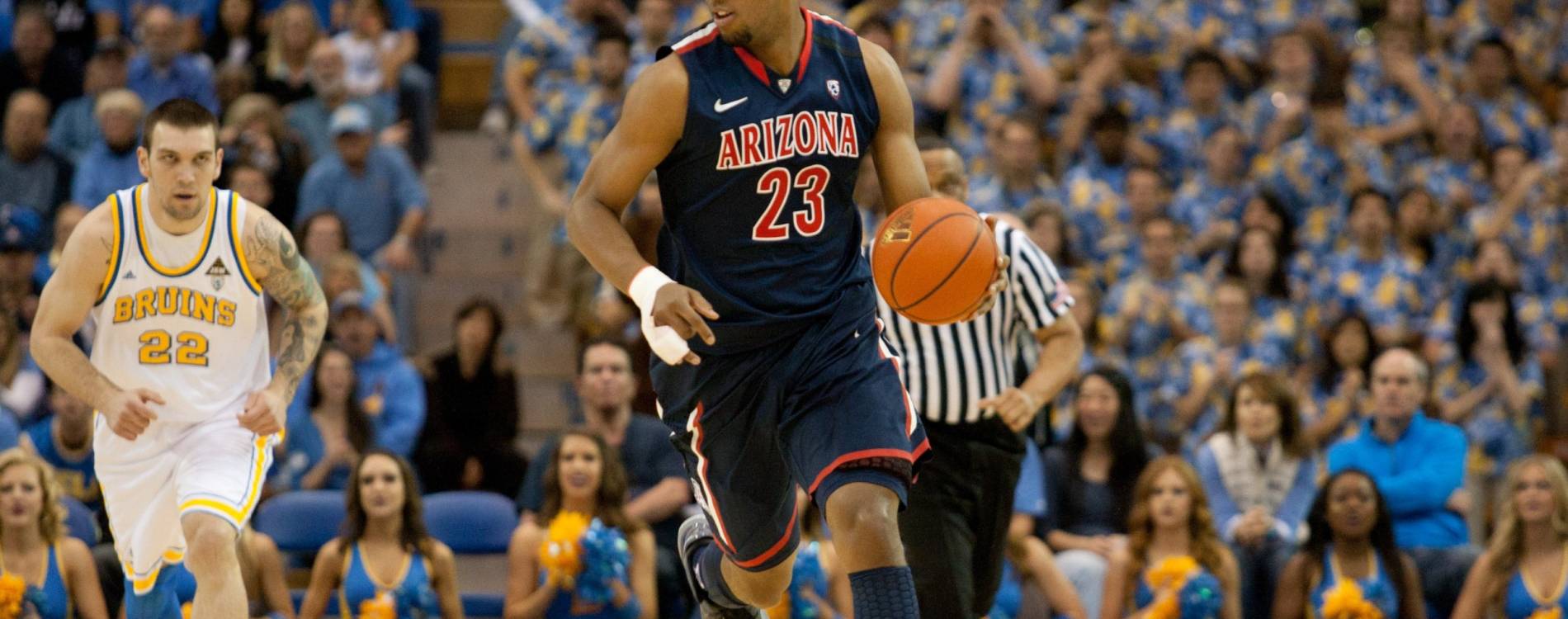 The Arizona Wildcats' Derrick Williams dribbles against UCLA Bruins