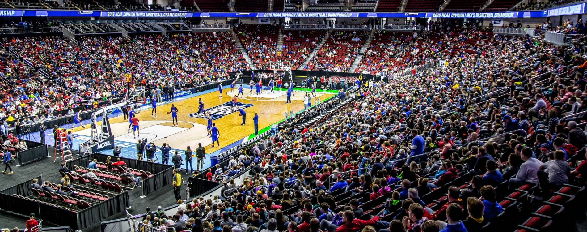 The Kansas Jayhawks warm up before a March Madness game