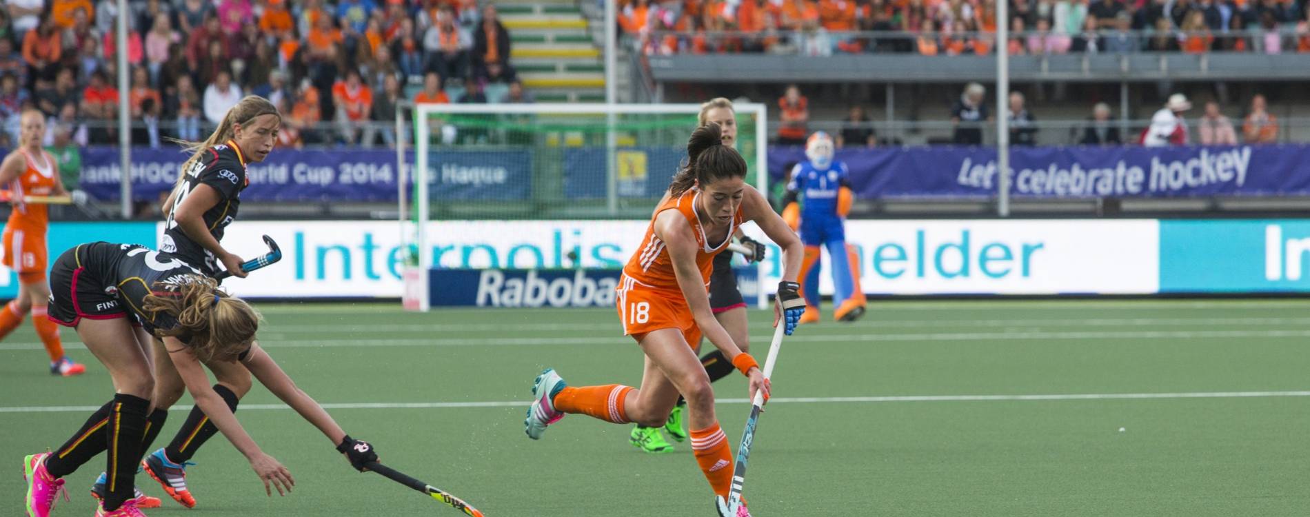 The Netherlands playing Belgium at the Women's Hockey World Cup