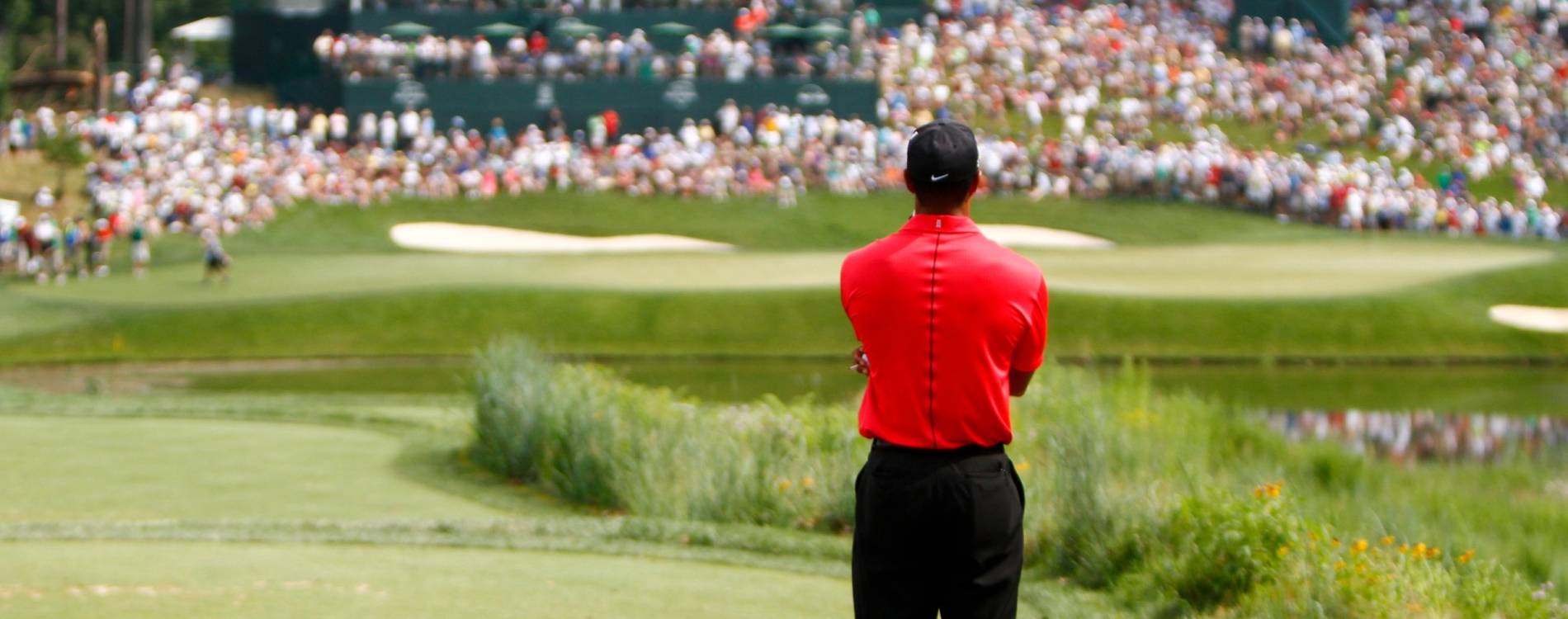 Tiger Woods prepares to tee off at Congressional Country Club