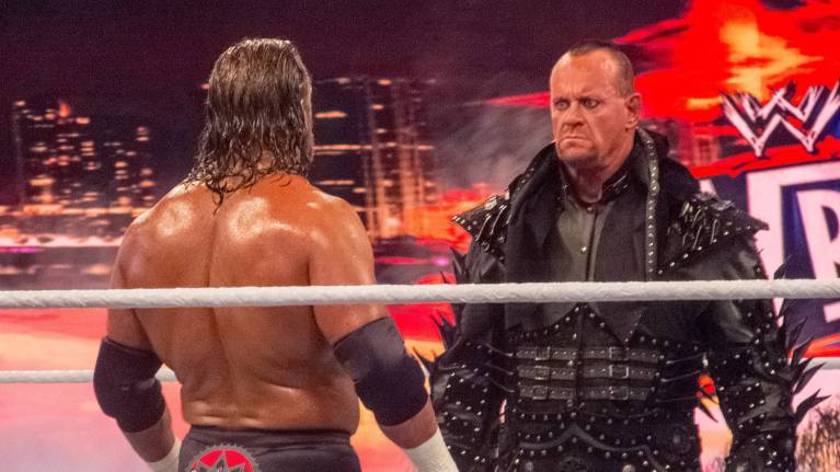 Undertaker squares up to HHH