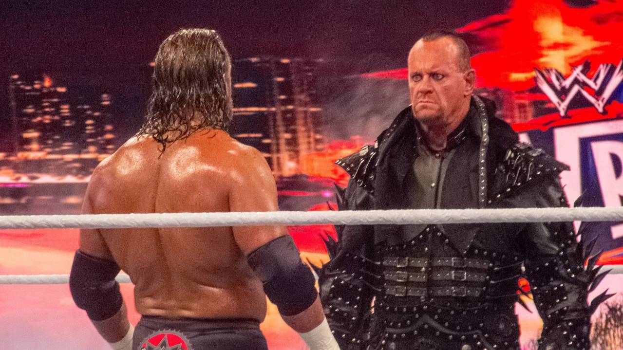 Undertaker squares up to HHH
