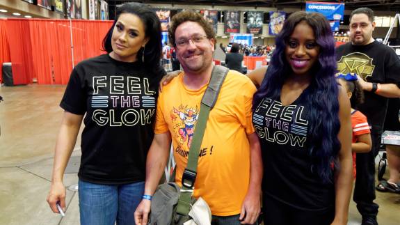 Wrestlers pose for pictures at WrestleMania Axxess