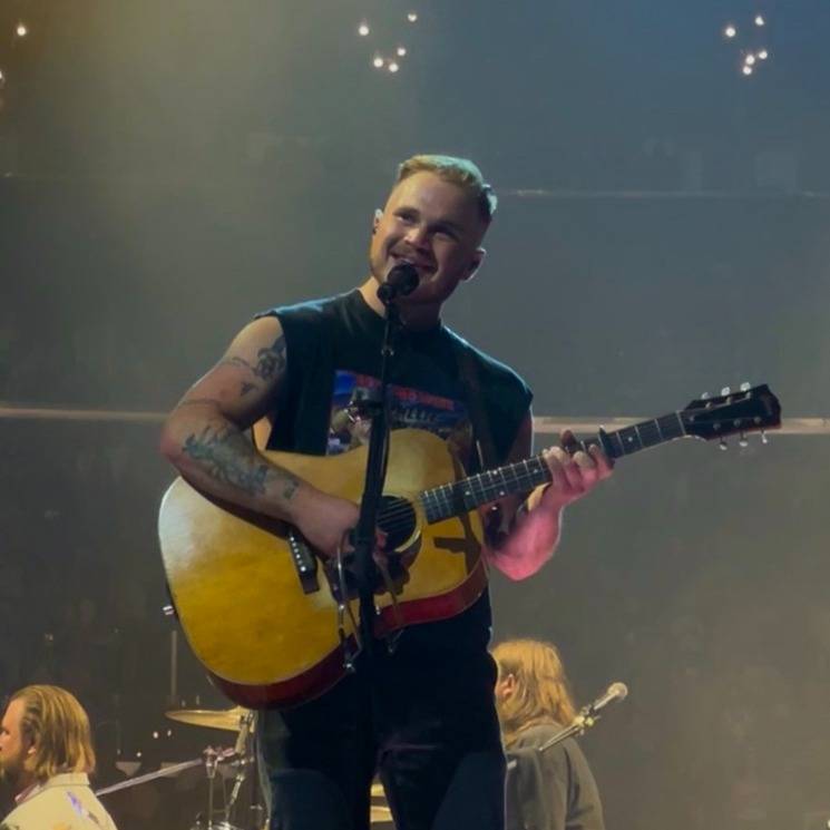 Zach Bryan performing at Crypto.com Arena